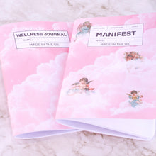 Load image into Gallery viewer, Pink Journal titled &#39;Manifest&#39; with clouds and cherubs. 
