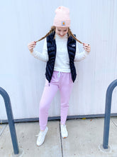 Load image into Gallery viewer, girl wearing purple sweatpants, vest, and beanie
