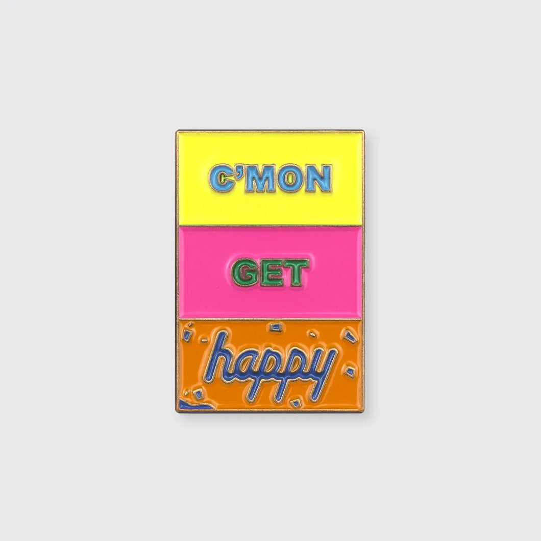 Color blocked enamel pin with the colors yellow, pink, and orange in the background with the words 'C'mon Get Happy