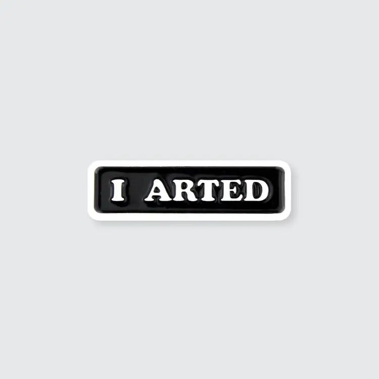 Black Enamel Pin with the words 