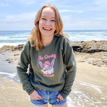 Load image into Gallery viewer, Girl wearing sweatshirt on the beach with an angel logo 
